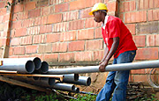 Boniface Tushime joins colleagues in construction works for a four star hotel in Kiyovu. (Photo / George Kagame)