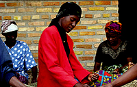 Women sort coffee beans, Rwandau2019s premier export and source of foreign currency. (Reuters photo)