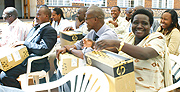 Gasabo district workers recieve laptops at the district head quaters.