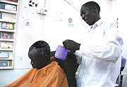 Salons are filling up with men wanting to dye their hair. (Photos / E. Mucunguzi).