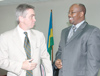 Canadian envoy, Ross Hynes, with finance minister James Musoni