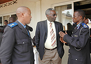 Assistant Commissioner of Police George Rumanzi (R) talks to NEC President Chrysologue Karangwa while Northern Region Police Commander Sup. Peter Hodari looks on. (Photo/ J. Mbanda)