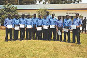 WE MADE IT: Rwanda police officers pose for a group photo with certificates after completing course. (Photo/ G.Barya)