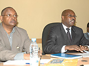 The National Coordinator of Pharmacies Task force in the Ministry of Health,Viatuer Mutanguha (R) talking to journalists while Leon Fundara of the NPA looks on (Photo G.Barya)