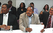 Members of the Business community attentively view a video conference at the World Bank offices in Kigali recently. (File Photo).