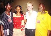 UNITED AGAINST CLUSTER MUNITIONS : Rurangirwa Cyrille, ALSARu2019s Chairperson, Rose Kanyenfura and Francis Karangwa with a Norwegian Official. (Photo/ E.Kagire).