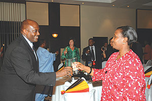 Foreign Affairs Minister Rosemary Museminari and Ambassador of Uganda Richard Kabonero toast Ugandau2019s Independence Day Friday at Serena Hotel, Kigali. (Photo/G.Barya)