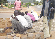 Workers constructing a pavement in Kigali City.(File photo).