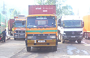 Cross border trade to increase: Trucks ferrying imports. (File photo).