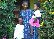 Mutamuliza at home with two of her daughters. (Photo/K.Llewellyn).