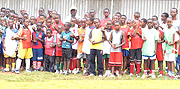 FOR THE FUTURE: APR academy players pose for a group photo before the tree-planting activity. At the back row in cap is their coach Rene Kalimunda. (Photo / C. Karenzi).