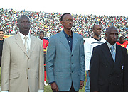 Praised: President Paul Kagame(C) has been praised for his continued support to the development of football in the region. Right is Cecafa president Leodegar Tenga. (File photo).