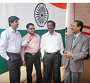 Vinod Tharamal (R) chats with other members of the Indian Community in Rwanda during the celebrations yesterday. (Photo J Mbanda)