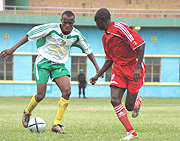 FLASHBACK: Atracou2019s Joseph Kabagambe  takes on Prince Louis  Stella Shaban  in the Confederations Cup retun leg at Amahoro stadium two yearu2019s ago. (Photo / G. Barya).