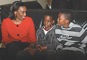 Rose Kabuye with her children at Kigali International Airport soon after arriving from France yesterday. (Photo/G.Barya)