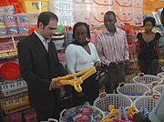 Arash Ashtari (L) and Prisca Mujawamariya tour the Arian Expo. (Photo J Mbanda).