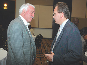 RDB CEO Joe Ritchie (L) and the Second Secretary of the Embassy of the Russian Federation Dr Mikhail Nikitin at Serena Hotel. (Photo/ J Mbanda)