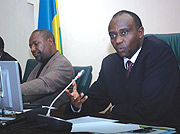 Senator Wellars Gasamagera  (L) and Senator Prosper Higiro.