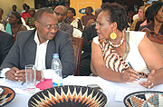 Minister Protais Musoni chats with Gahaya Linksu2019 Joy Ndungutse. (Courtesy photo).