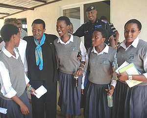 The acting Commissioner General of Police, Mary Gahonzire, and the Director of Community Policing Emmanuel Butera with some of  the students who took part in the debate. (Photo/ J. Mbanda).