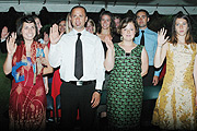 American Peace corps Volunteers taking oath during the ceremony at the American ambassadoru2019s residence in Kacyiru yesterday.(Photo G. Barya)