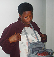 Anita Mukamana caught by CCTVs shoplifting 4kg of beef at Simba supermarket. 