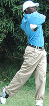 CHASING MILLIONS: Hakizimana takes a swing during a previous event at Kigali Golf Club. (File Photo).