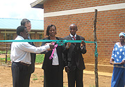 (L-R)  Nyarugenge District Mayor Eugene Rutayisire, Hope Rwanda u2018sPastor Andrew Palau, Kigali City Vice Mayor in charge of Welfare Jeanne du2019Arc Gakuba  and the Headmaster of Karama P.Sch. Patrick Bimenyimana at the launch.