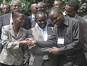 Information Minister Louise Mushikiwabo (L) shares a light moment with participants of the Regional media conference held at Serena Hotel yesterday. (Photo/ J Mbanda).