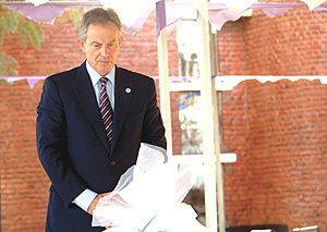 HONOURING THE DEAD: Former British premier Tony Blair pays his respects to the victims of the 1994 Genocide against the Tutsi at the Nyamata Memorial Site yesterday. (Photo/ PPU).