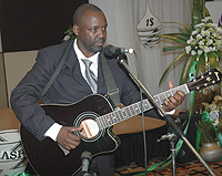 Jean Paul Samputu performs at the One Dollar campaign launch.