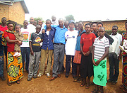 Ruhanga children pose outside their house (Photo P. Gathoni)