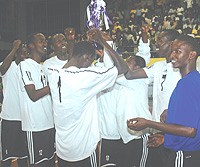 APR players with their Genocide Memorial trophy on sunday. The club are eyeing a quadruple of titles this year. (Photo /J. Mbanda)