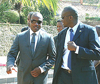 TALKING HEAD: Brian Lara (L) discussing issues with Sports and Culture Minister Joseph Habineza during his visit to Rwanda on Thursday. (Photo / G. Barya)