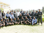 Police officers,district mayor(Middle) in a group photo before the the training session. (Photo: D. Ngabonziza)