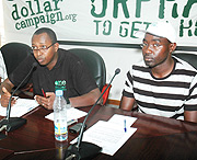 One Dollar Campaign Chairman Gustave Karara (L) and Claude Birasa who led the delegation of footballers at the press briefing. (Photo J Mbanda)