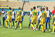 Atraco and Rayon Sport players shake hands before their league clash on May 10, 2009.