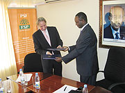 Dutch envoy, Frans Makken, and Hategeka at PSF offices on Tuesday. (Photo courtsey) 