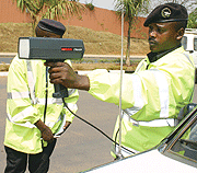 WILL GET YOU:  Traffic policemen on duty with the new acquired equipment yesterday. (Photo/ F. Goodman)