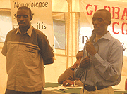 Pascal Niyomugabo (holding microphone) openly forgave Tharcise Ruhangintwari who killed his family during the Genocide.  (Photo/ M.Gahigi)