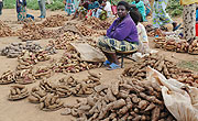 A woman selling sweet potatoes in a local market(File Photo).