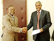 Prof Romain Murenzi and Dr Charles Murigande after the handover ceremony yesterday (PPU Photo)