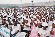 Health workers applaud President Kagame at the National Stadium recently