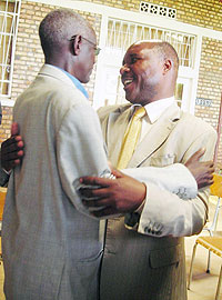 Gakenke Mayor Pierre Damien Hakizayezu (L) being congratulated after clearing him of Genocide charges. (Photo: P. Ntambara)