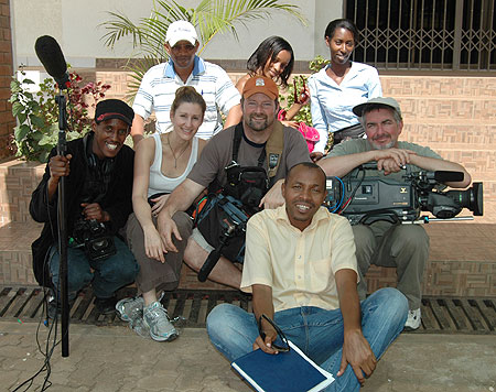 US based u201cFilm Festival Rwandau201d crew pose for a photo with some of the local film students.