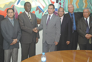 LAP Green CEO Dr Khaled A. Kagigi shaking hands with Premier Bernard Makuza during their meeting yesterday.( Photo/ F. Goodman )