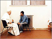 Pope John Paul II and his would be assasin, Mehmet Ali Agca.