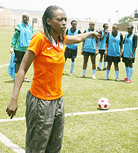 AS Kigali women football coach Grace Nyinawumuntu wants to retain the league trophy. (File photo)