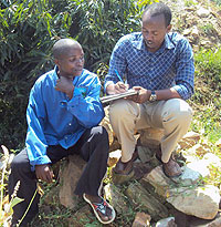 RURAu2019s Supervisor in Karongi district Emmanuel Twagirayezu interviews a resident during the exercise on Tuesday. (Photo: S. Nkurunziza)