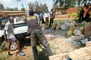 Illicit drugs and polythene bags being loaded on a Police pick-up truck car at Kicukiro Police Station before being destroyed yesterday. (Photo/ J. Mbanda)